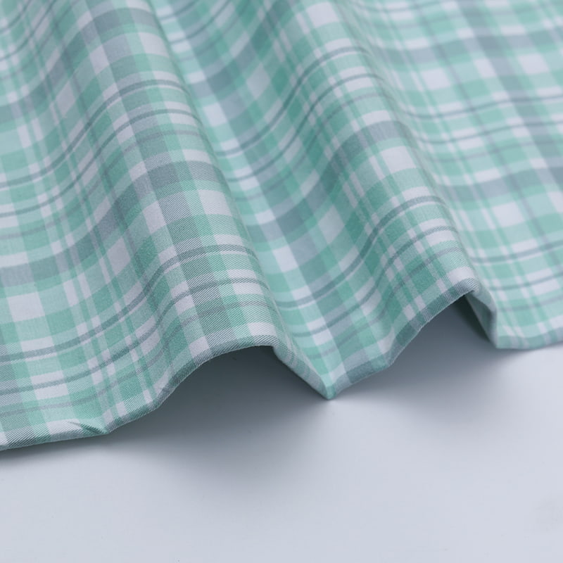 Tyg av bomull/nylon (Spandex).