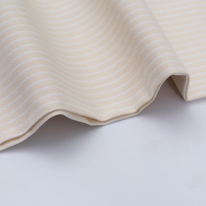 Tyg av bomull/nylon (Spandex).